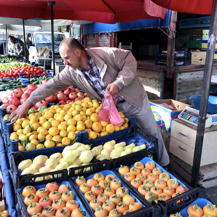 Man with fruit stand