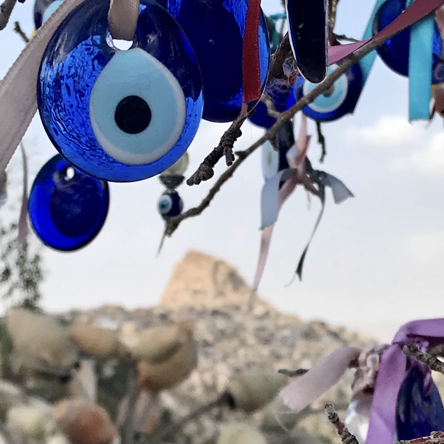 evil eyes hanging from tree