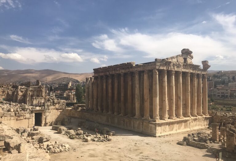 View of impressive Temple of Bacchus with huge stone columns surrounding ancient building in Baalbek, Lebanon