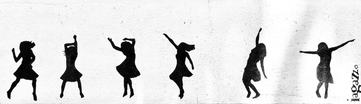 dancing females in silhouette