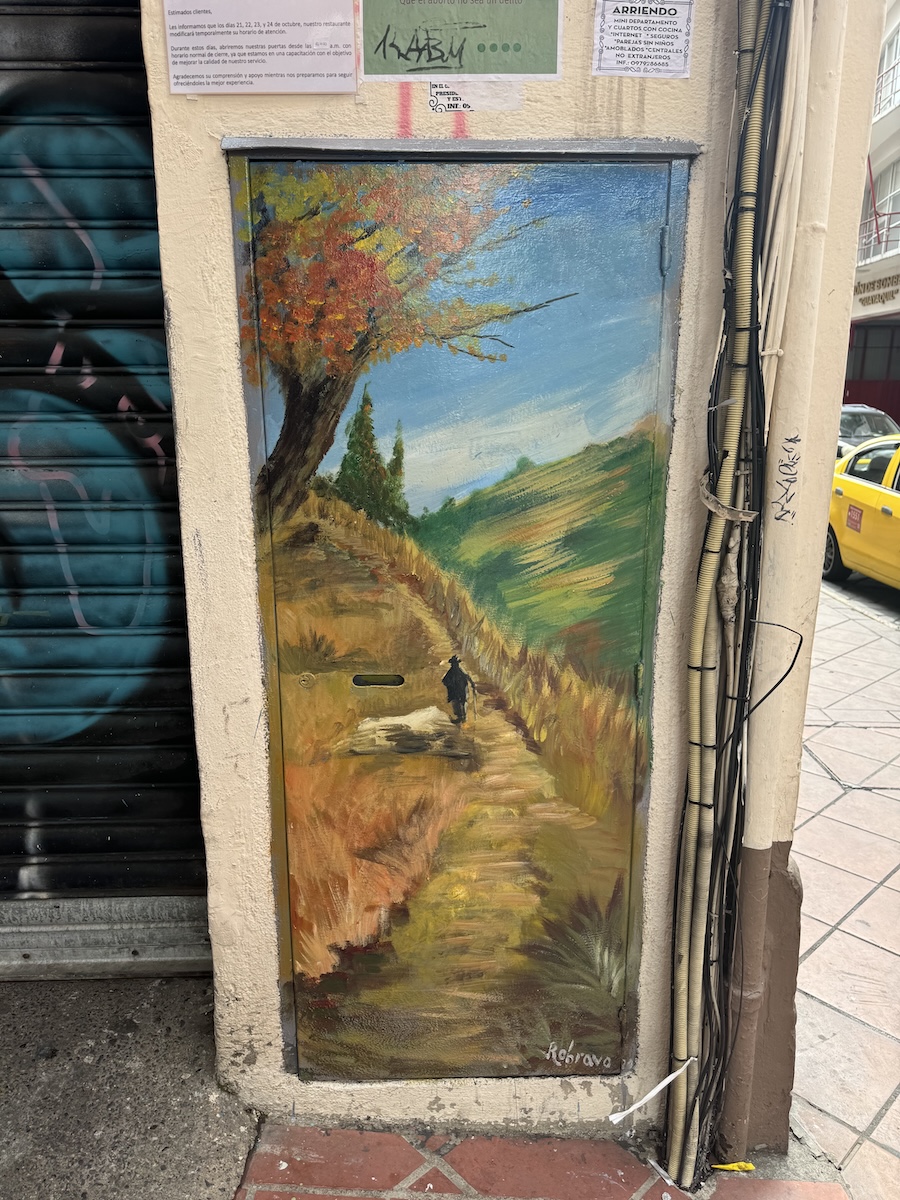 Hand-painted portrait of a local Cuenca character on a metal utility box by Roberto Bravo in Cuenca, Ecuador