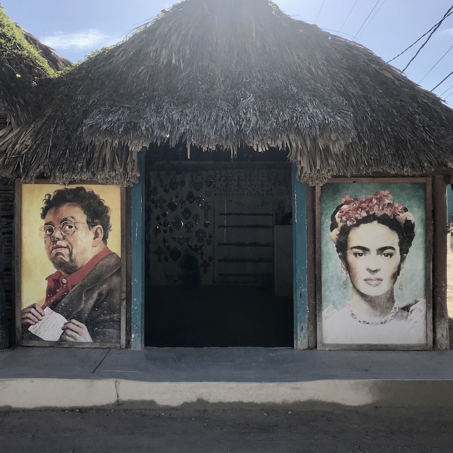 portraits on a hut
