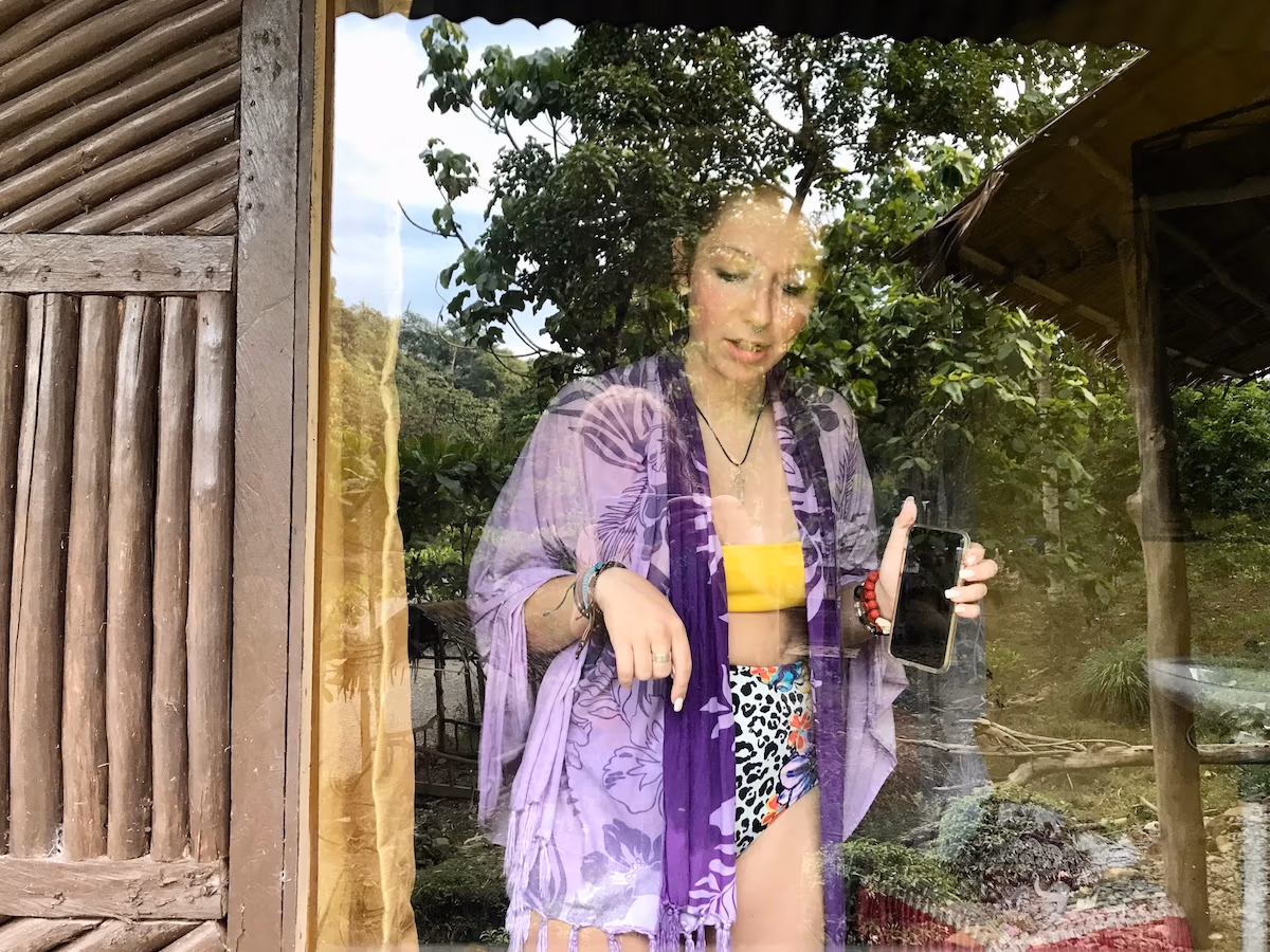 Female looking out of window