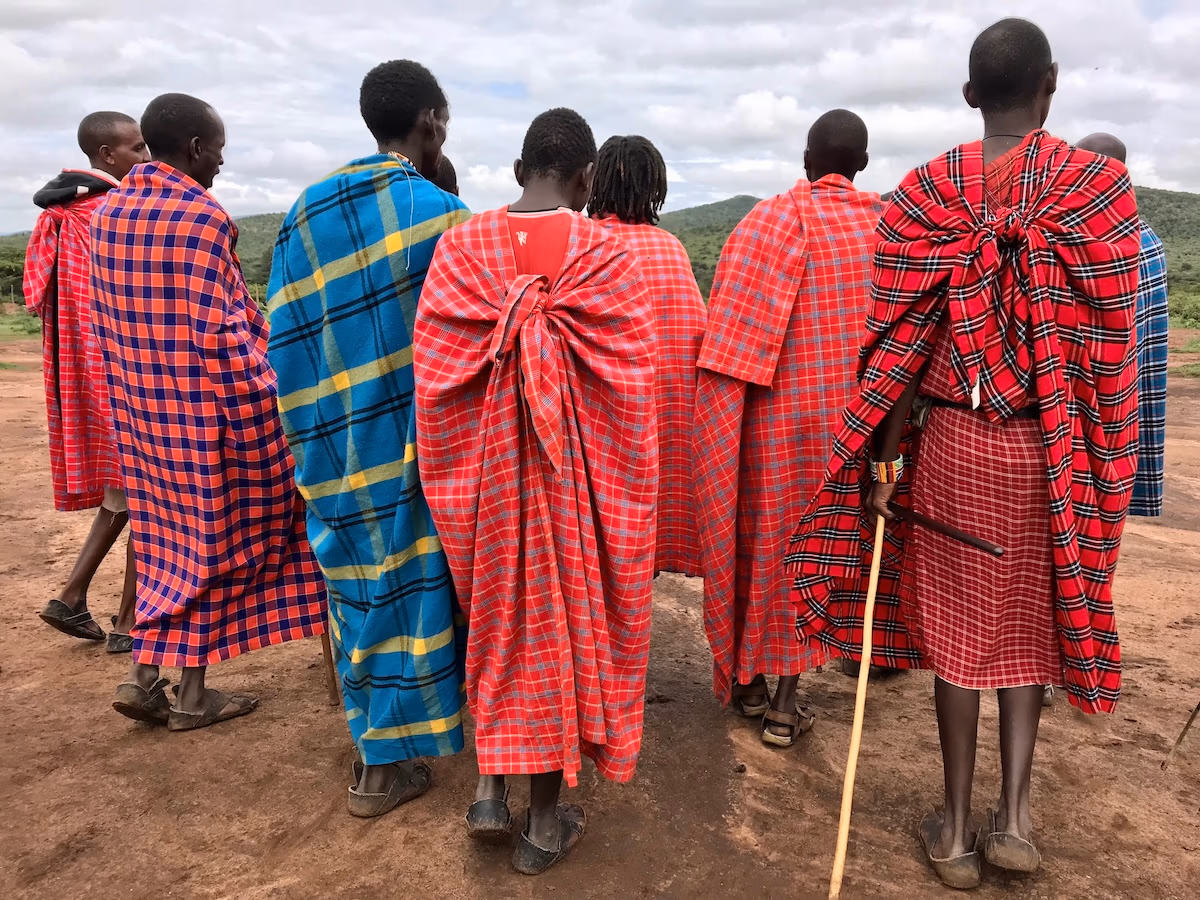 maasai with colorful clothes facing the other direction