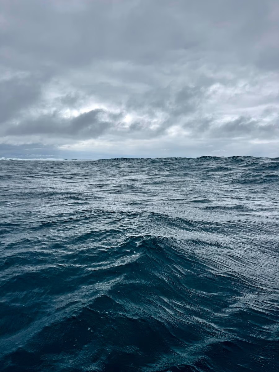 Open ocean clouds on horizon