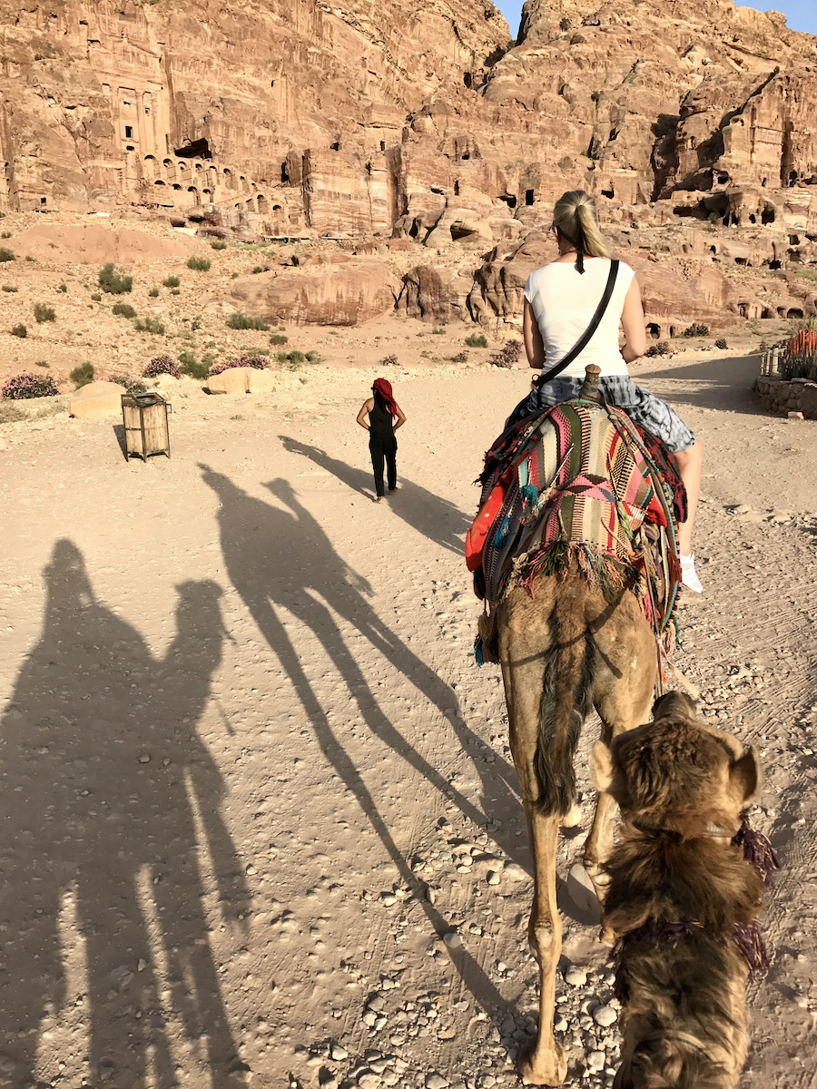 view of woman on a camel