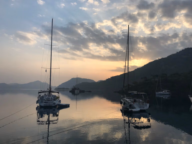 sail boats at sunrise