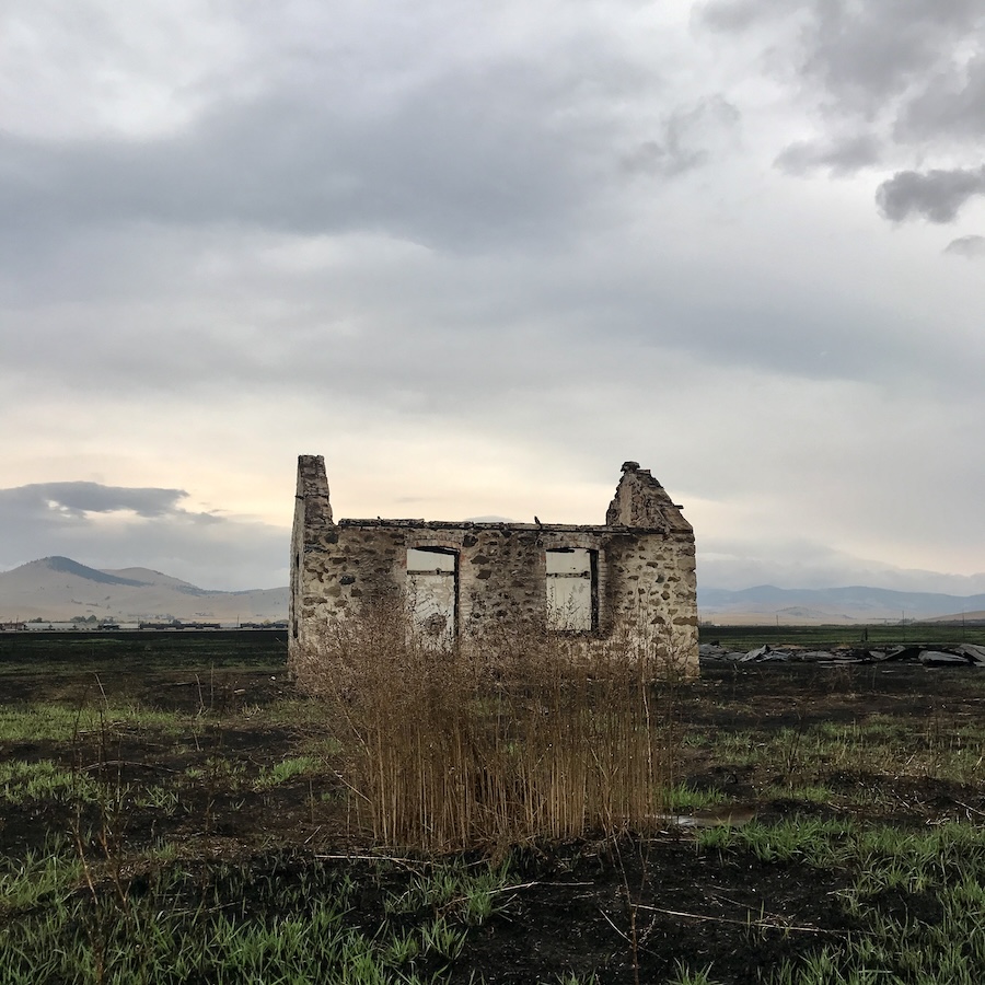 view of old rock home