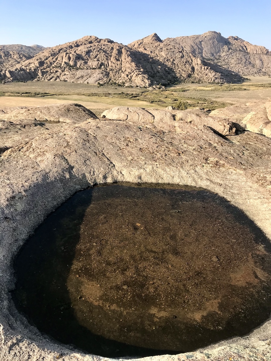 A pool of water in a rock bed