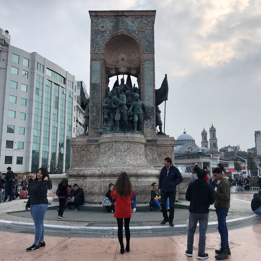 People looking at the Republic monument in Istanbul