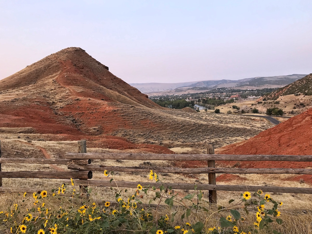 Red mountains with flowers