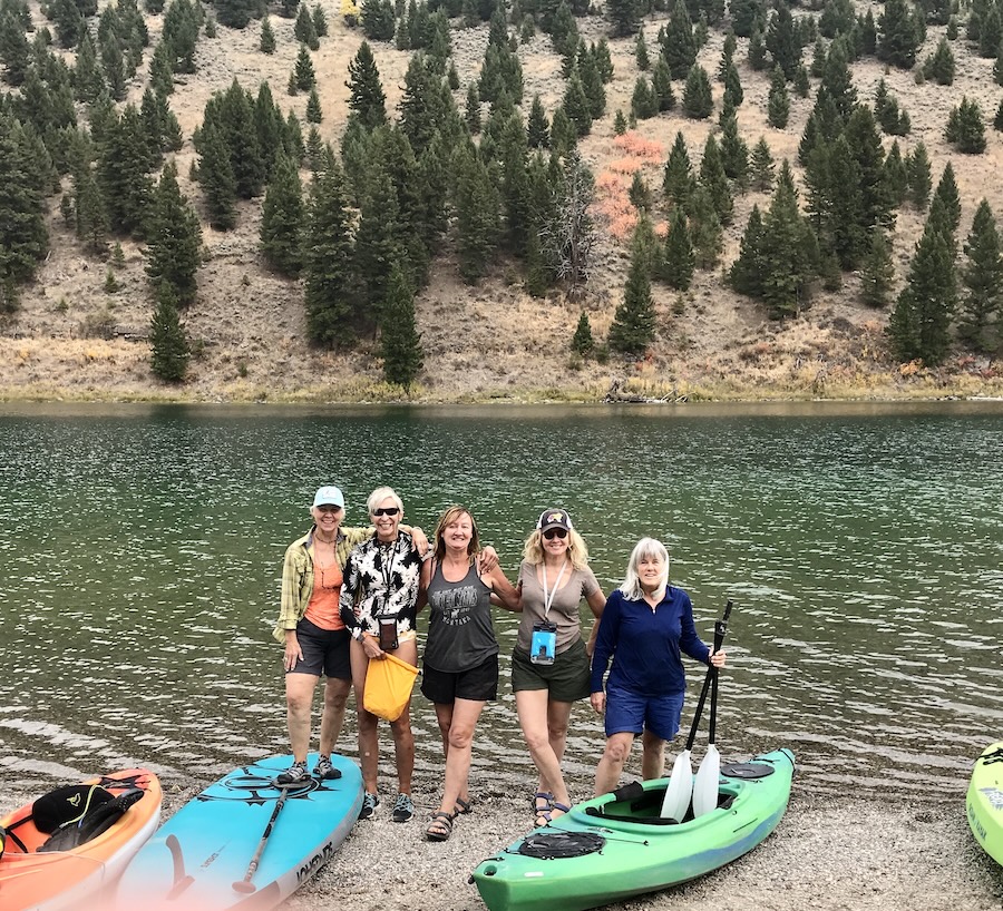 group of kayakers posing