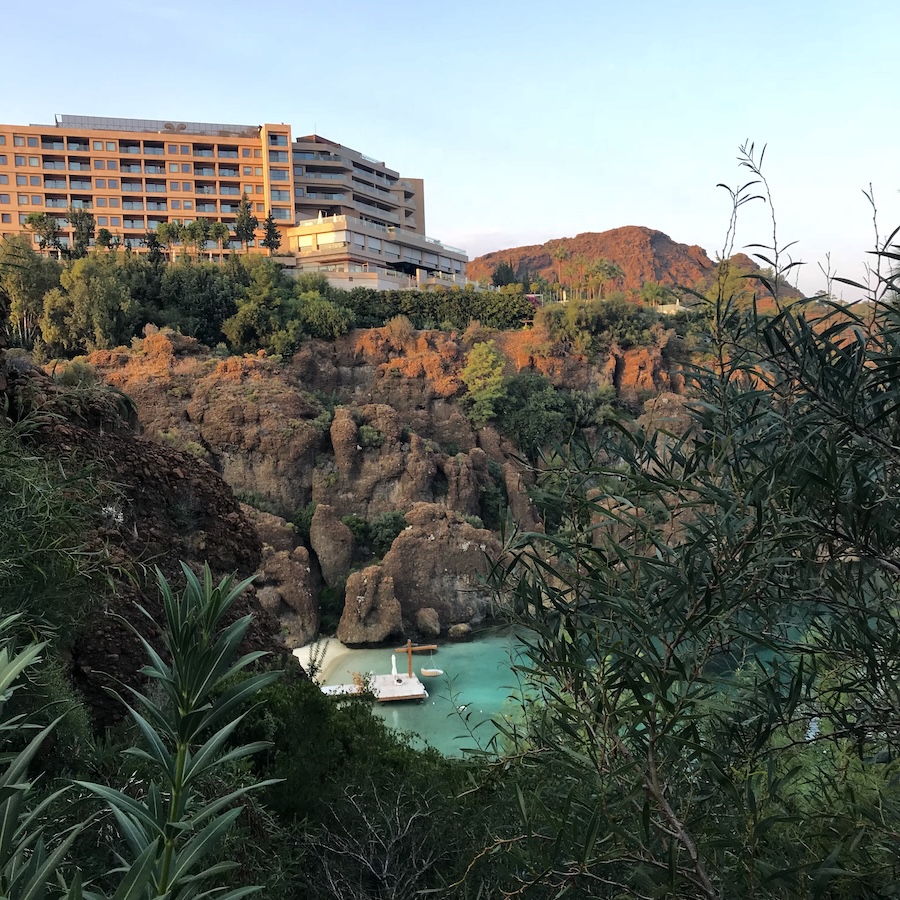 D-Maris Bay resort sits on above the blue green water of the cove