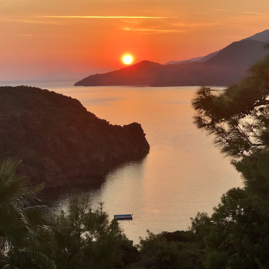 Sunset view of mountains sitting in the Aegean sea