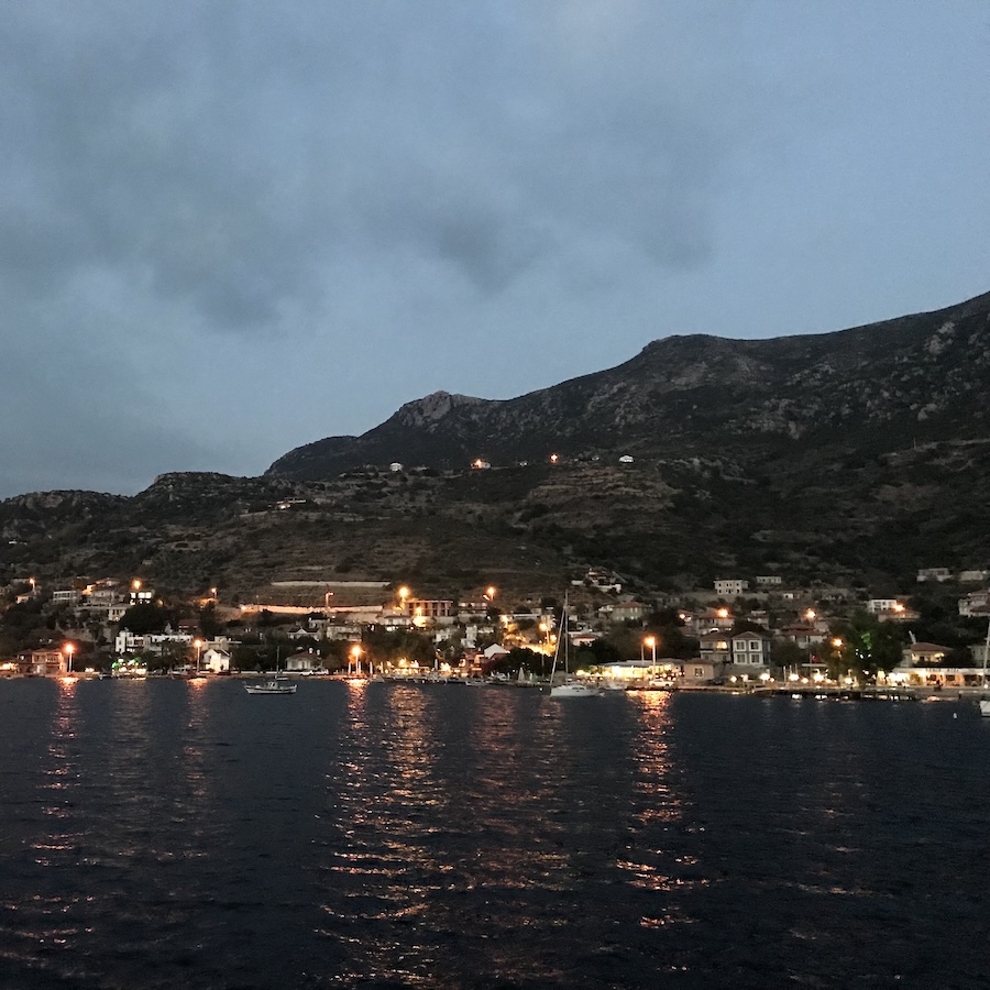 Lights of the village illuminate the hillside and the bay of Sogut on the Turkish coast
