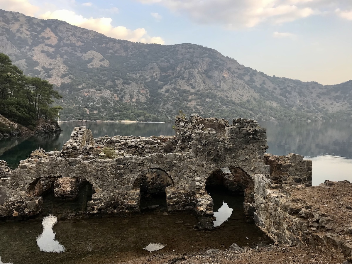 The stone remnants of the ancient city of Kekova sit partially submersed in the sea