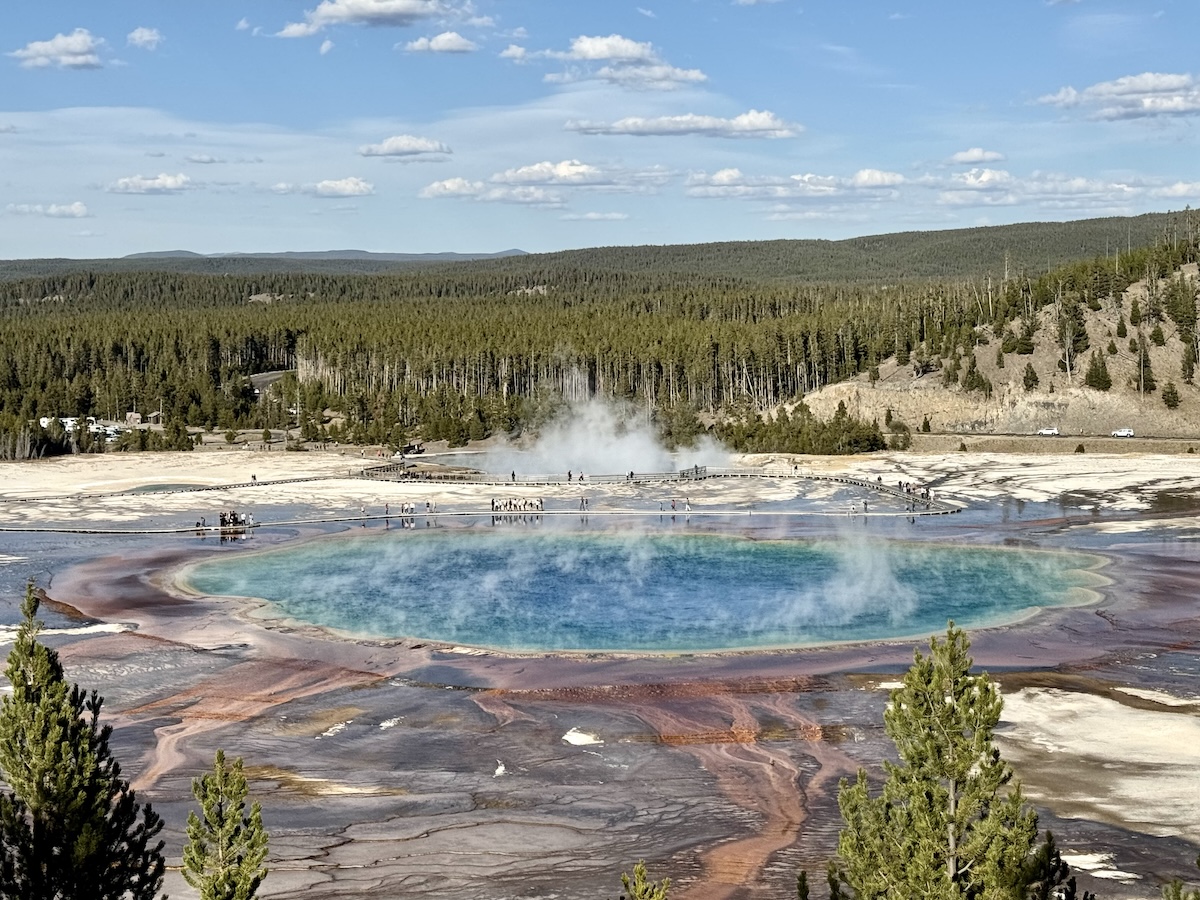 Aqua blue and rust colors of the Prismatic Geyser in Yellowstone